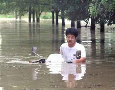 Name:  Motorcycle-in-water-china.jpg
Views: 32
Size:  9.7 KB